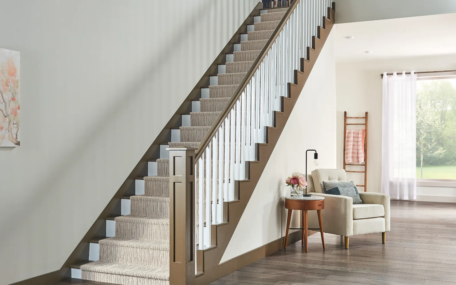 Carpeted staircase in a clean home interior